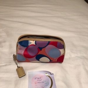 Used Coach makeup bag
